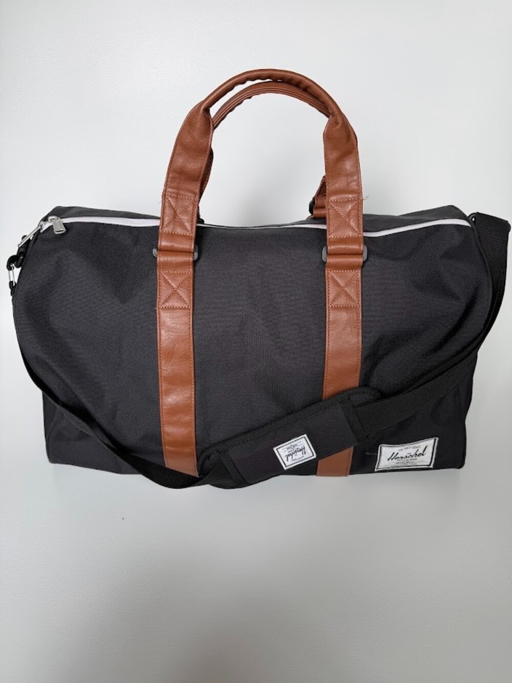 Herschel Supply Co Novel Duffle Bag Black Tan Leather Trim Travel Weekender Gym